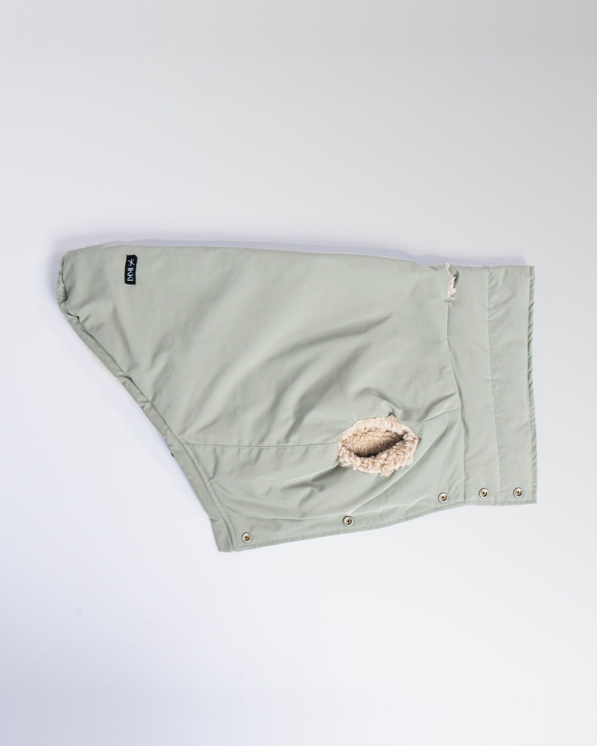 Bianca Vest in Mint, laid flat, smooth side