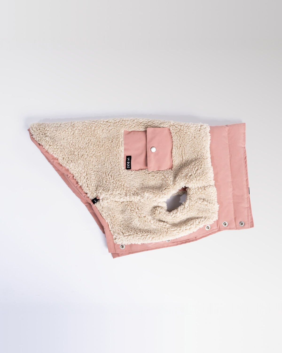 Bianca Vest in Rosewood, laid flat, sherpa side