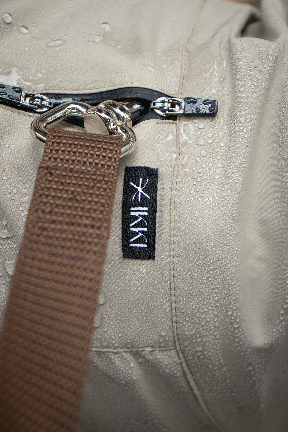 Rain drops on the Helena in Taupe, with the Noah Leash in Coffee
