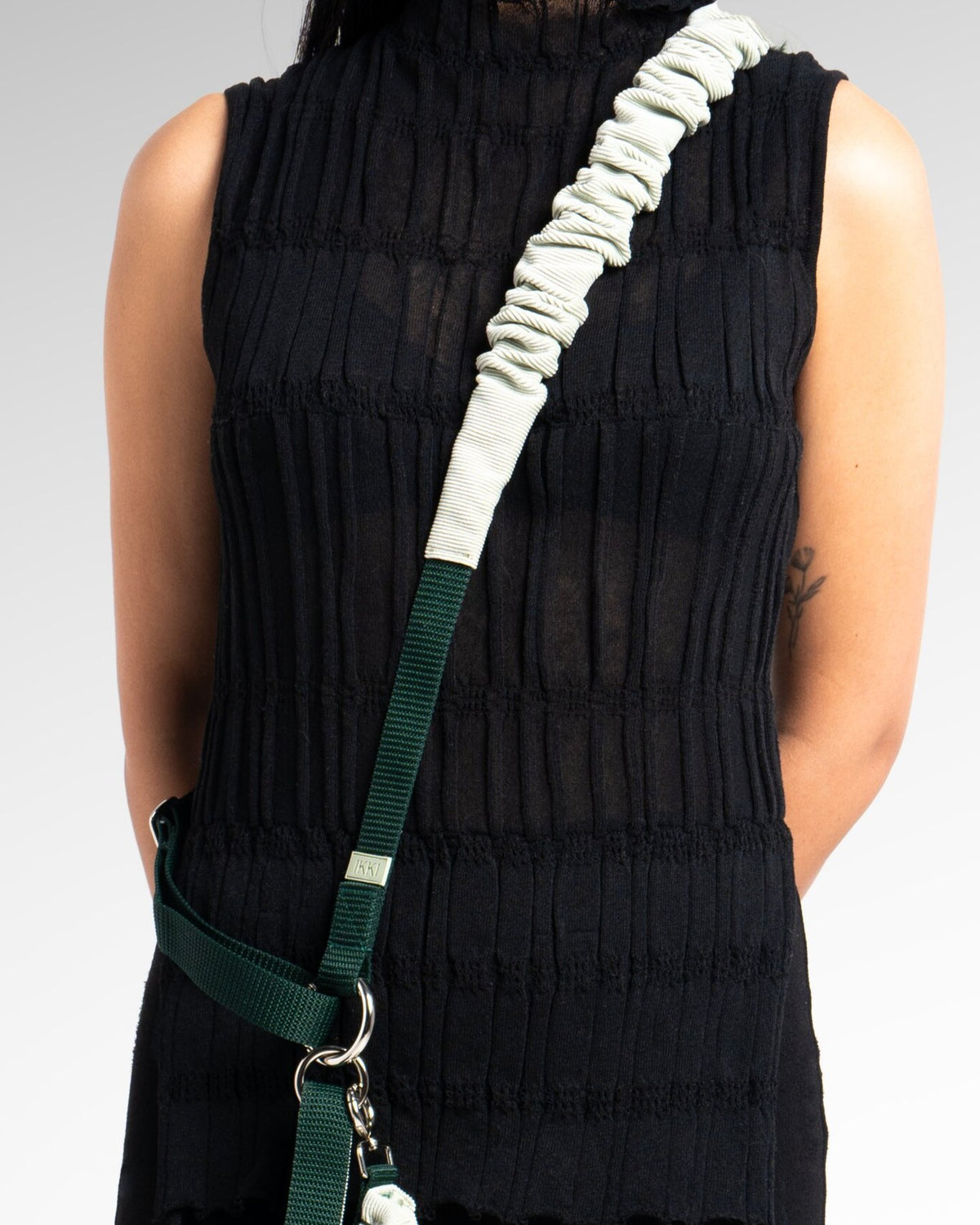 Noah Body Strap in Mint + Bottle Green, close-up detail