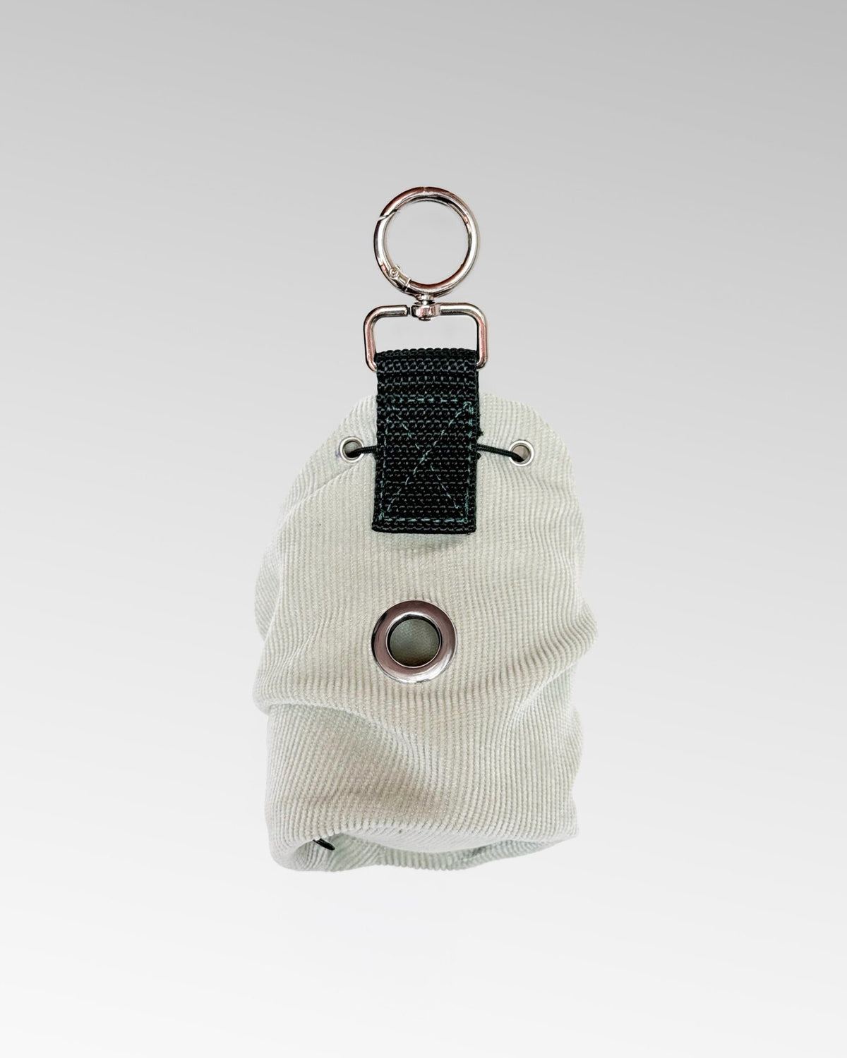 Noah Pouch in Mint + Bottle Green, back with bag dispenser eyelet