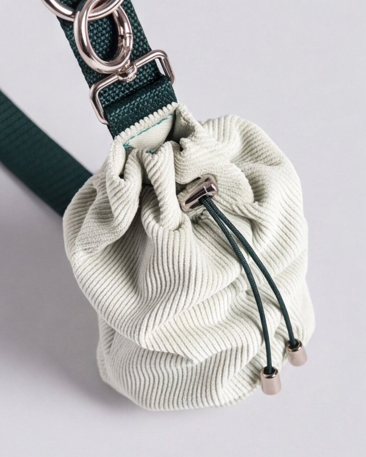 Noah Pouch in Mint + Bottle Green, front with drawstring