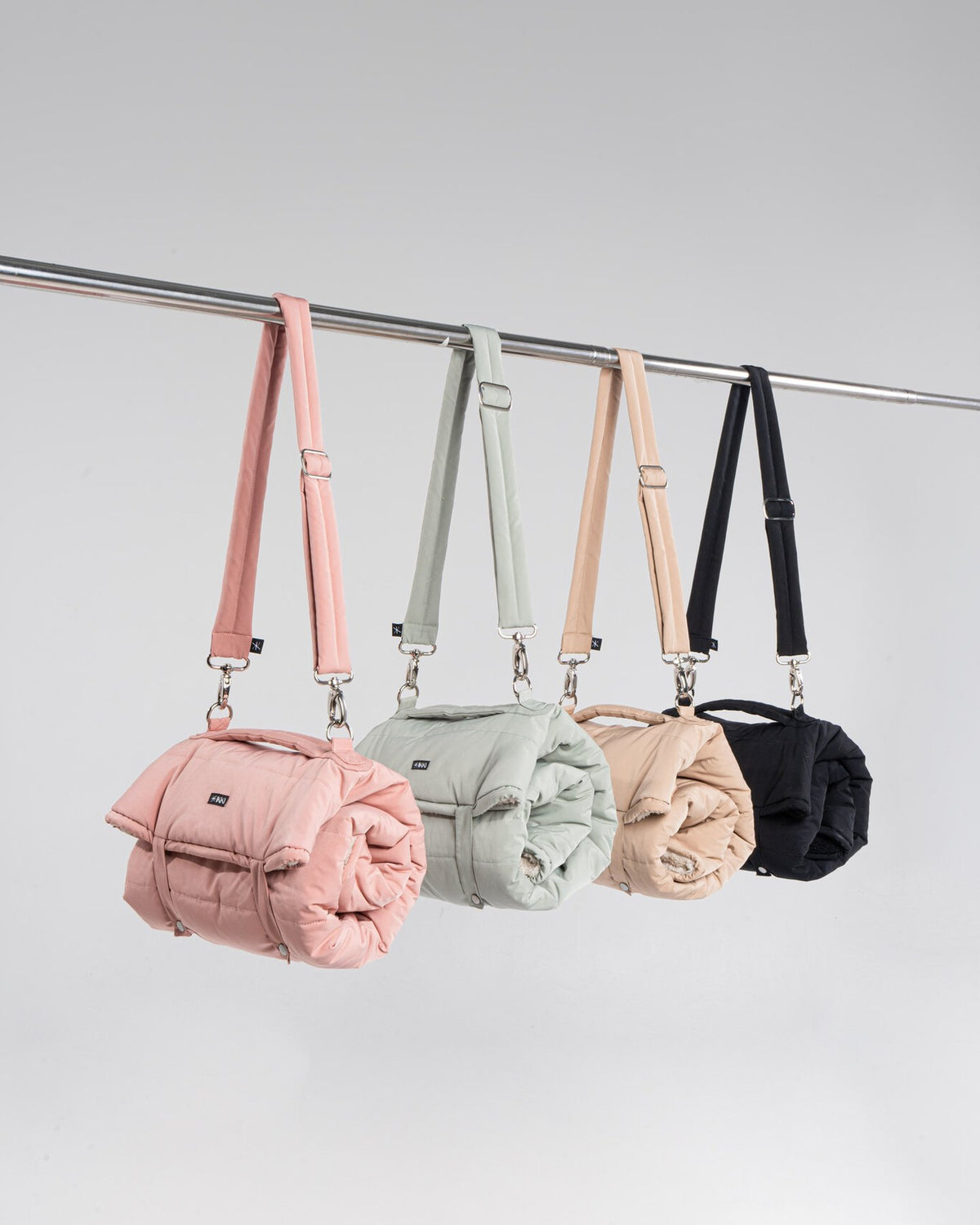 Ole Mat in all four colours, rolled up